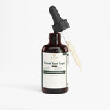 An amber glass dropper bottle labeled 'ELITAR Normal Blood Sugar' with a black dropper cap and a glass pipette resting against the bottle, shown on a clean white background.